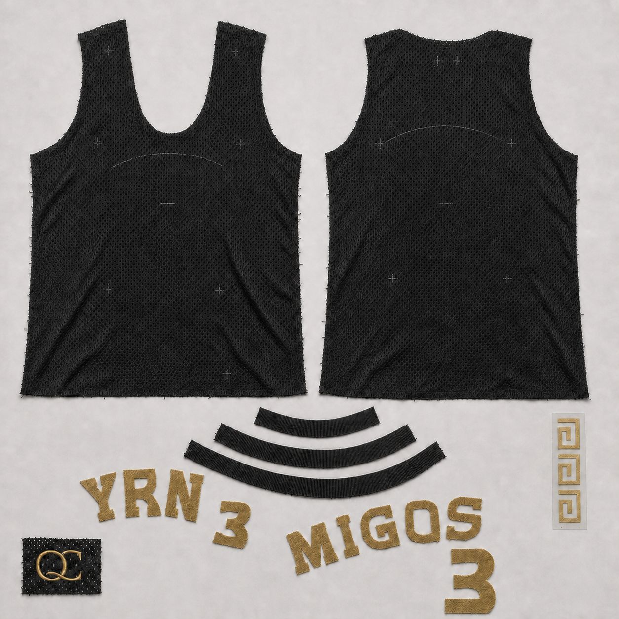Pattern-cut black mesh panels, rib-knit trim, gold tackle twill and vinyl components laid out before assembly.