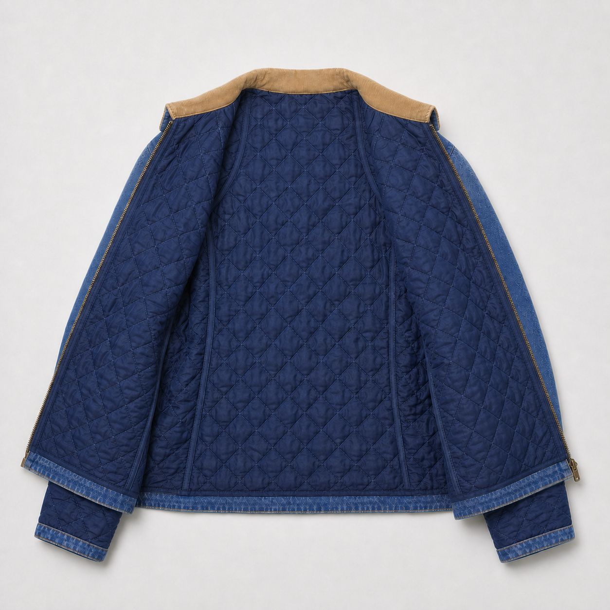 Cherry LA work jacket spread open — navy diamond-quilted lining, corduroy collar.