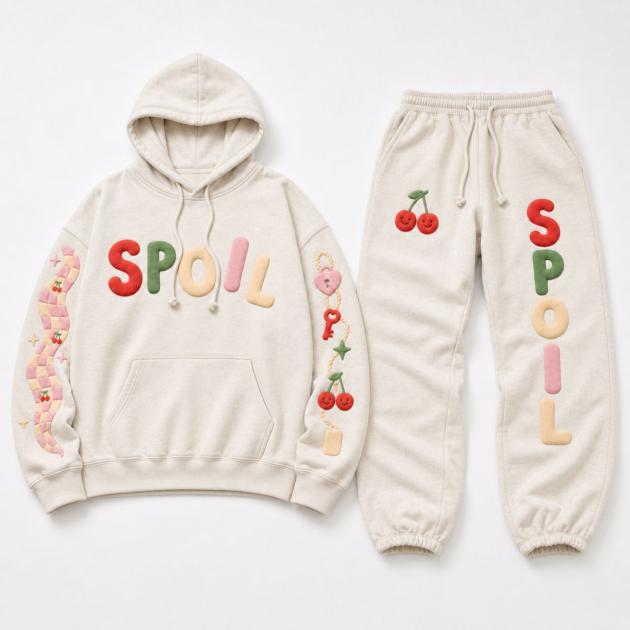 Spoil Talent Mgmt puff-print sweatsuit by Studio ATM — cream heavyweight fleece with 3D puff artwork.