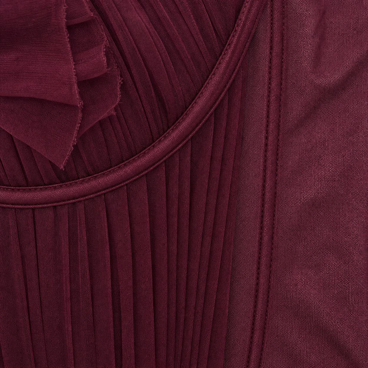 Macro of the finished Dahlia gown bodice - pleated chiffon converging into piped boning channels above sheer mesh